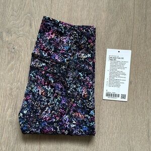 EUC fast and free high rise tight 25" floral spray multi size 2 lululemon